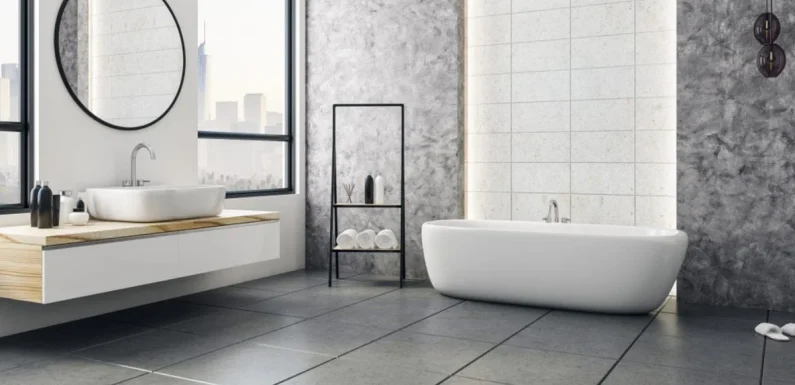 Why do bathroom designers recommend tile flooring?